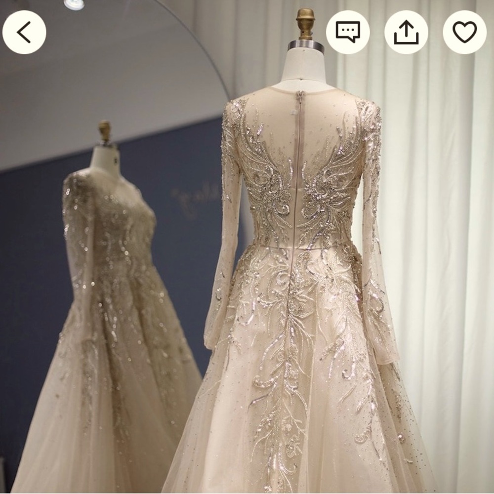 Handmade crystal embroidered evening gown in Gold colour.